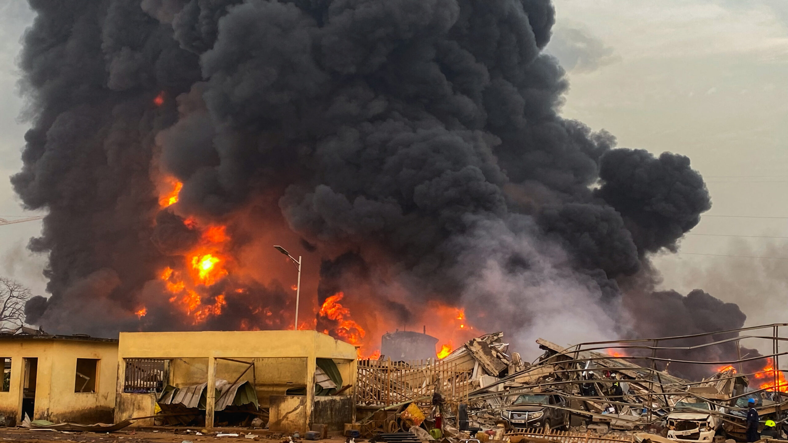Fire burns after a blast at an oil terminal in Conakry