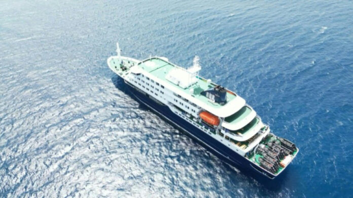 Passengers plead for clarity as virus-hit cruise remains stranded off Cape Verde